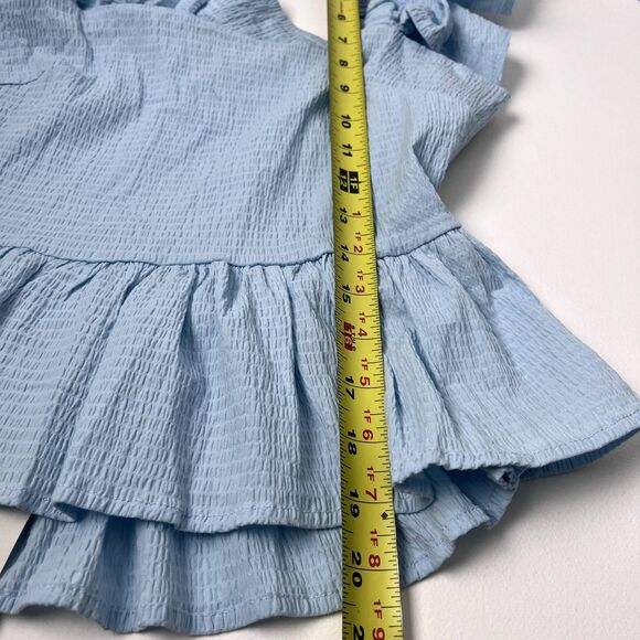 Anisa Peplum Jessie Bow Back Blouse in Light Blue by Francesca’s - Picture 15 of 16